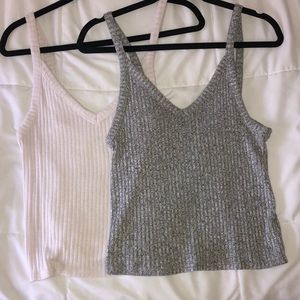 grey and white sweater tanks